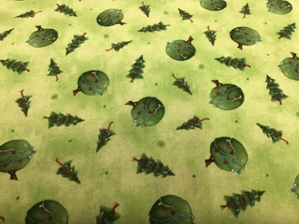 CHRISTMAS TREES BY STACEY YACULA Green Fabric