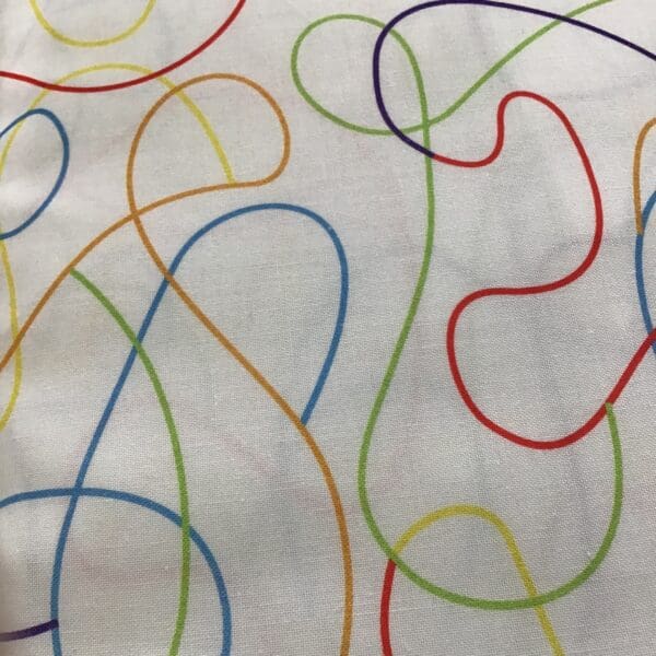 Squiggle 785501 Rainbow on White Extra wide 108″ wide backing fabric Squiggle 785501 Rainbow on White Extra wide 108" wide backing fabric