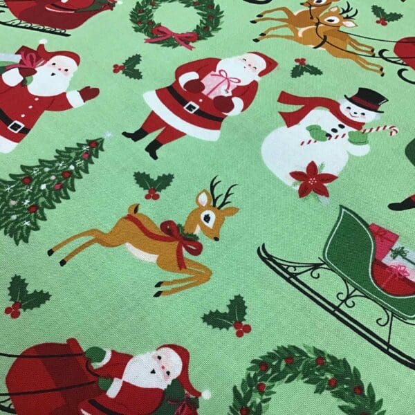 Craft Cotton - Merry and Bright -  C8390 Santa on green background by Reynard