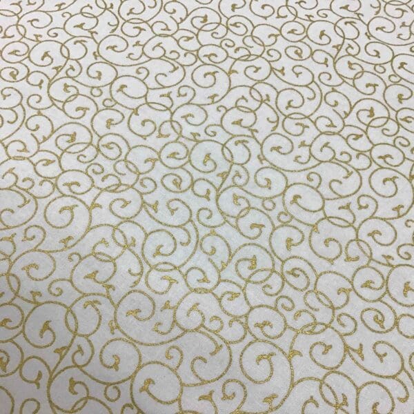 Craft Cotton Christmas print -  312 gold swirls on cream background by Reynard