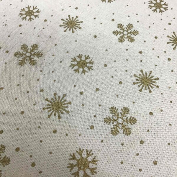 Craft Cotton Christmas print - 126 gold snowflake on natural background by Reynard