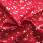 Fluttering Florals Burg 6624020 small flowers on bright pink background by Camelot Fabrics